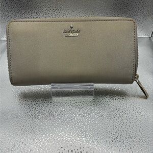 Used Silver sparkle Kate Spade wallet.